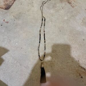 Elegant Black and Gold Beaded Necklace with black tassel